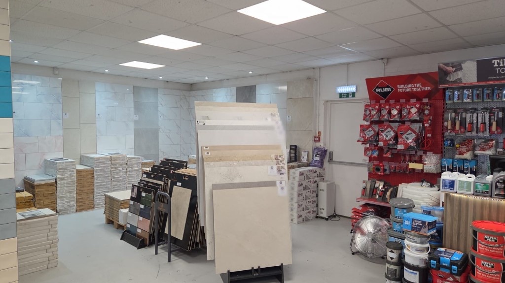Front of the Tile Master MK showroom — tile samples, stock and tiling tools